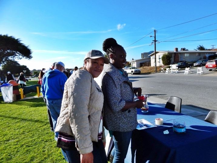 Two Women Working a Booth Together